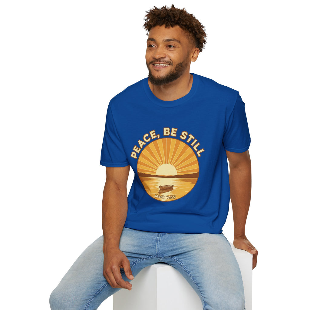 T-shirt featuring “Peace, Be Still”, sunrise detail and coffee detail and vintage lettering; confident character.