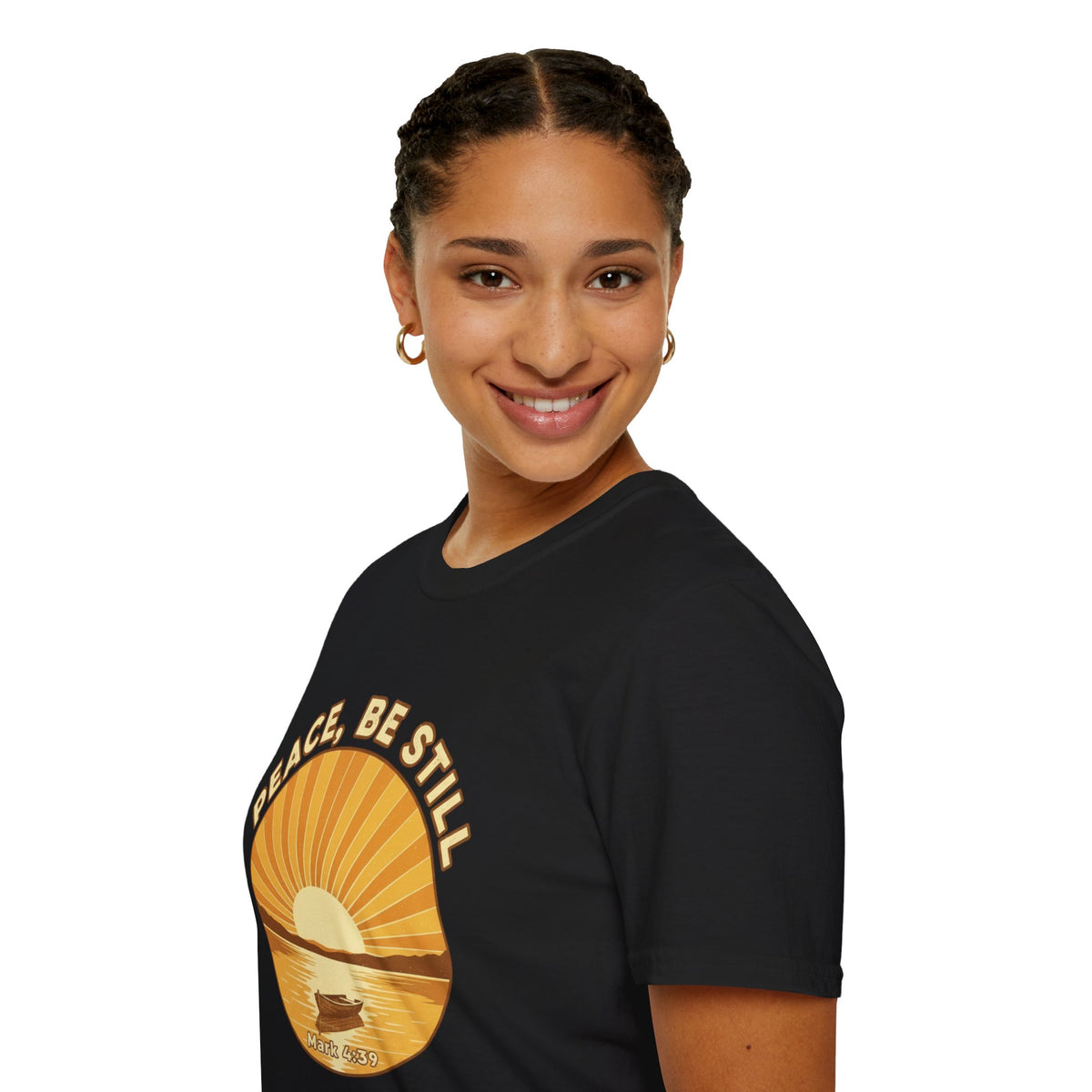 T-shirt featuring “Peace, Be Still”, sunrise detail and coffee detail and vintage lettering; uplifting confidence.