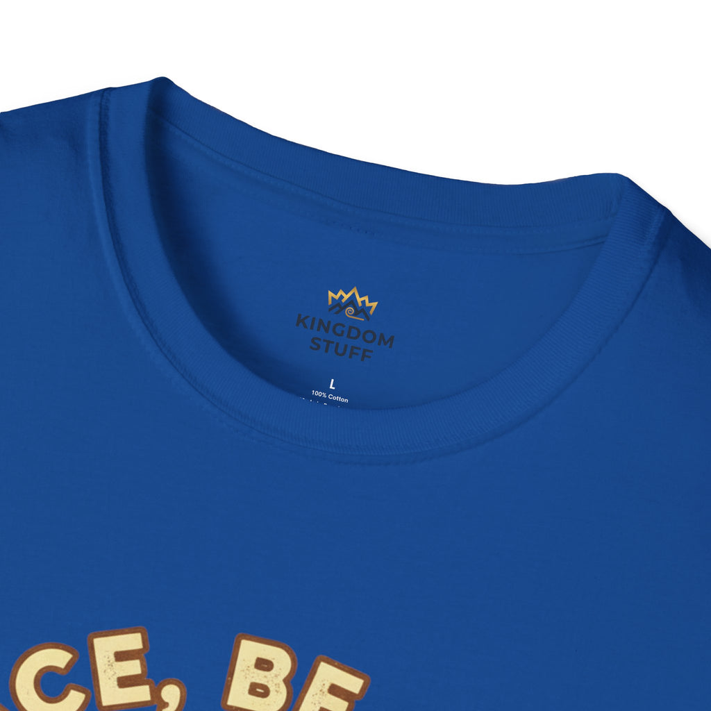 T-shirt featuring “Peace, Be Still”, sunrise detail and coffee detail and vintage lettering; enduring hope.