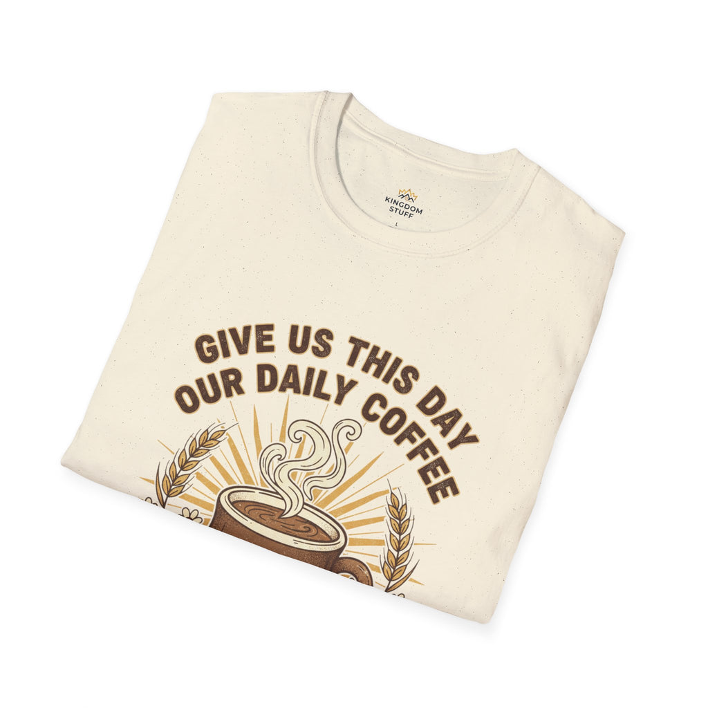 T-shirt featuring “Give Us This Day Our Daily Coffee”, coffee detail and bold lettering; hopeful spirit.