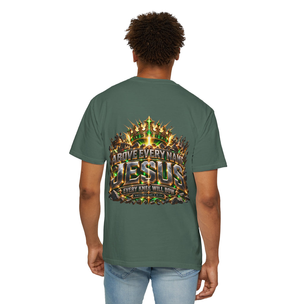 T-shirt featuring “Above Every Name Jesus”, crown imagery and  and forged-style lettering; reflective strength.