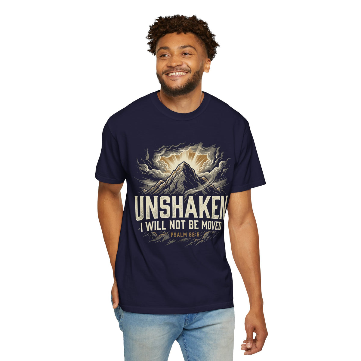 T-shirt featuring “Unshaken Mountain Illustration”, mountain imagery and fire detail and vintage lettering; enduring hope.