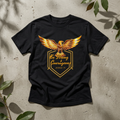 Kingdom Stuff “Be Strong & Courageous Eagle T‑Shirt” design with cross imagery and eagle artwork; everyday faith style.
