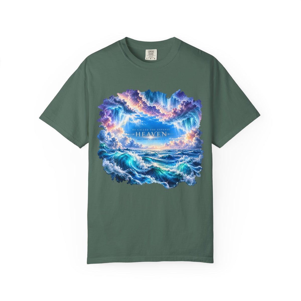 T-shirt featuring “Heavenly Ocean Waves”, cross imagery and bold lettering; calm strength.