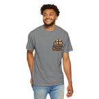 T-shirt featuring “It Is Finished Cross Flames”, cross imagery and  and forged-style lettering; resilient faith.