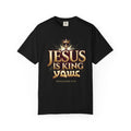 Black T-shirt featuring “Jesus Is King”, cross imagery and crown imagery and vintage lettering; courageous energy.