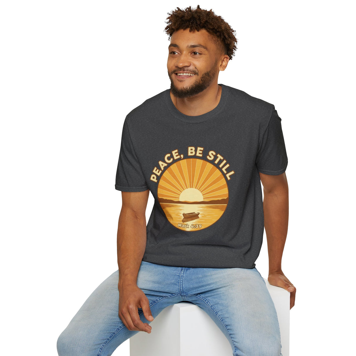 T-shirt featuring “Peace, Be Still”, sunrise detail and coffee detail and vintage lettering; joyful confidence.