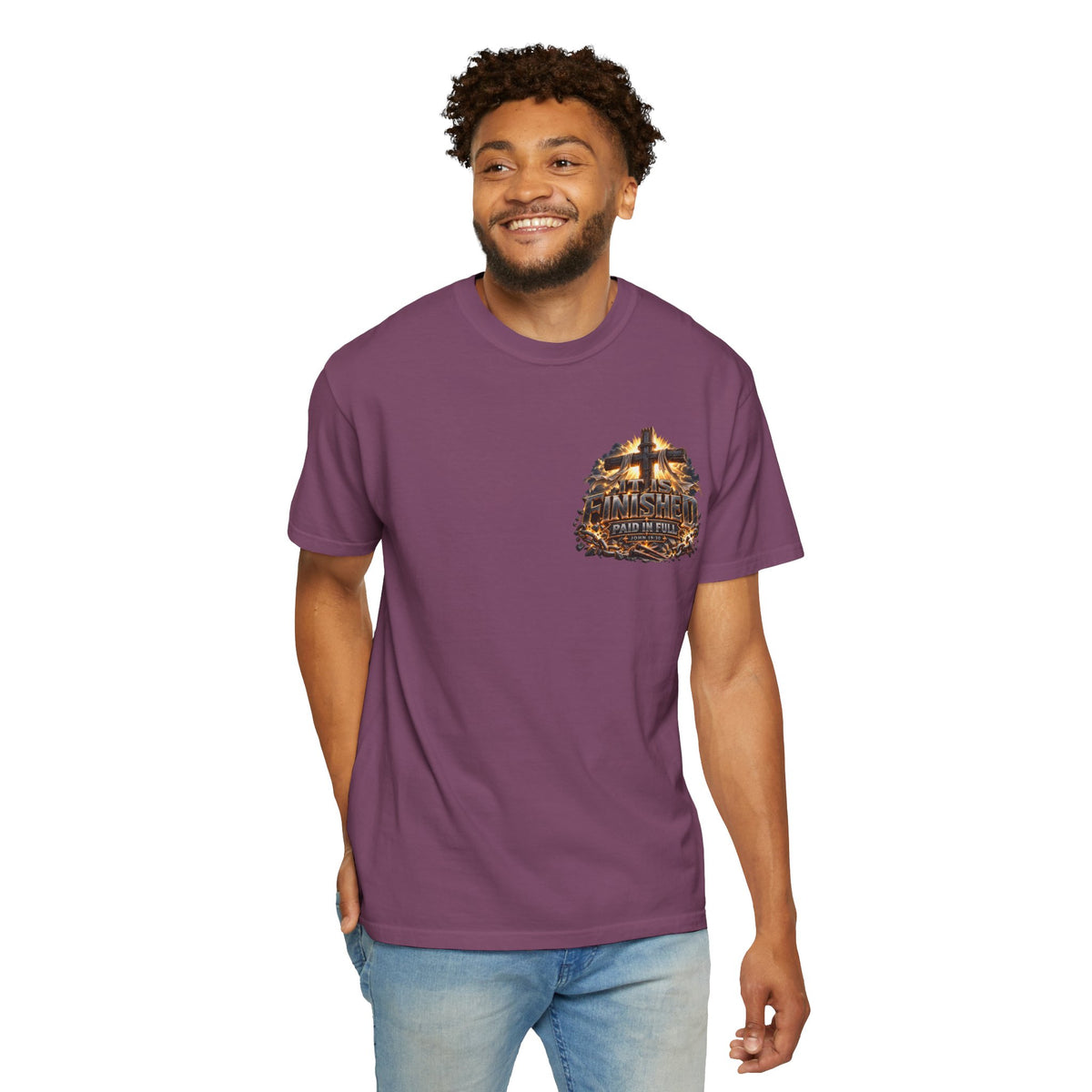 T-shirt featuring “It Is Finished Cross Flames”, cross imagery and  and forged-style lettering; joyful confidence.