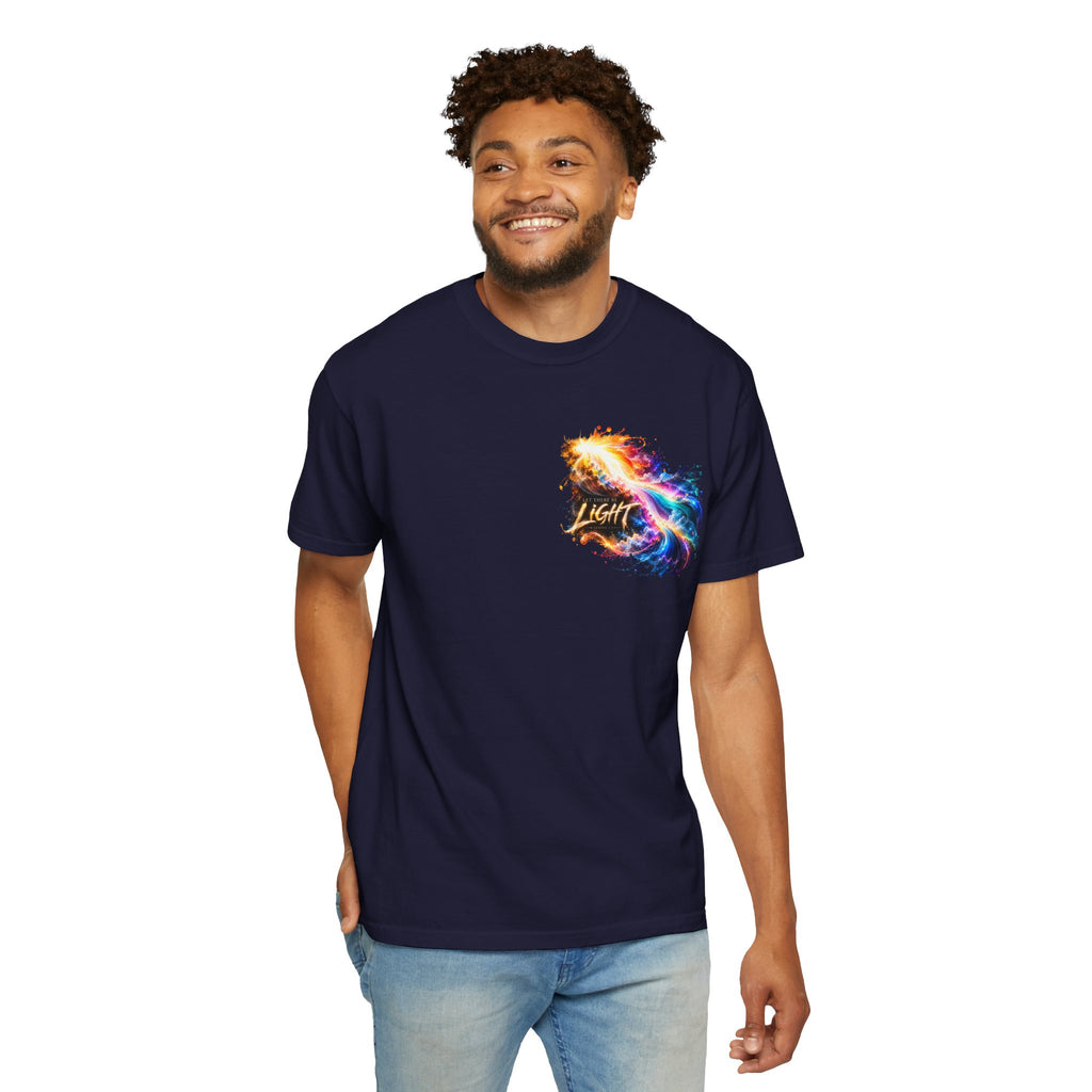 T-shirt featuring “Rainbow Flame Feather 'Be the Light'”, cross imagery and  and script lettering; positive energy.