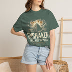 T-shirt featuring “Unshaken Mountain Illustration”, mountain imagery and fire detail and vintage lettering; resilient faith.